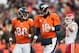DENVER, CO - DECEMBER 30: Quarterback Peyton Manning #18 and wide receiver Demaryius Thomas #88 of the Denver Broncos run off the field after a score during a game against the Kansas City Chiefs at Sports Authority Field at Mile High on December 30, 2012 in Denver, Colorado. The Broncos defeated the Chiefs 38-3. (Photo by Dustin Bradford/Getty Images)