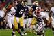 MIAMI GARDENS, FL - JANUARY 07: Everett Golson #5 of the Notre Dame Fighting Irish runs with the ball against C.J. Mosley #32 of the Alabama Crimson Tide during the 2013 Discover BCS National Championship game at Sun Life Stadium on January 7, 2013 in Miami Gardens, Florida. (Photo by Mike Ehrmann/Getty Images)
