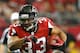 ATLANTA, GA - DECEMBER 30: Michael Turner #33 of the Atlanta Falcons rushes away from Michael Bennett #71 of the Tampa Bay Buccaneers at Georgia Dome on December 30, 2012 in Atlanta, Georgia. (Photo by Kevin C. Cox/Getty Images)