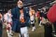 DENVER, CO - DECEMBER 30: Quarterback Peyton Manning #18 of the Denver Broncos is photographed as he walks off the field after a game against the Kansas City Chiefs at Sports Authority Field at Mile High on December 30, 2012 in Denver, Colorado. The Broncos defeated the Chiefs 38-3. (Photo by Dustin Bradford/Getty Images)