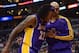 LOS ANGELES, CA - JANUARY 04: Jordan Hill #27 of the Los Angeles Lakers gets helped off the court by Robert Sacre #50 during a 107-102 Los Angeles Clipper win at Staples Center on January 4, 2013 in Los Angeles, California. NOTE TO USER: User expressly acknowledges and agrees that, by downloading and or using this photograph, User is consenting to the terms and conditions of the Getty Images License Agreement. (Photo by Harry How/Getty Images)