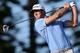 KAPALUA, HI - JANUARY 08: Dustin Johnson hits a tee shot on third hole during the final round of the Hyundai Tournament of Champions at the Plantation Course on January 8, 2013 in Kapalua, Hawaii. (Photo by Christian Petersen/Getty Images)