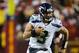 LANDOVER, MD - JANUARY 06: Russell Wilson #3 of the Seattle Seahawks runs the ball during their NFC Wild Card Playoff Game against the Washington Redskins at FedExField on January 6, 2013 in Landover, Maryland. (Photo by Patrick McDermott/Getty Images)