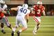 LINCOLN, NE - NOVEMBER 10: Quarterback Taylor Martinez #3 of the Nebraska Cornhuskers tries runs with the ball as linebacker Glenn Carson #40 of the Penn State Nittany Lions defends during their game at Memorial Stadium on November 10, 2012 in Lincoln, Nebraska. Nebraska beat Penn State 32-23. (Photo by Eric Francis/Getty Images)