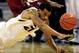 COLUMBIA, MO - JANUARY 08: Laurence Bowers #21 of the Missouri Tigers and Trevor Releford #12 of the Alabama Crimson Tide scramble for a loose ball during the game at Mizzou Arena on January 8, 2013 in Columbia, Missouri. (Photo by Jamie Squire/Getty Images)