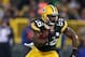 GREEN BAY, WI - JANUARY 05: Running back DuJuan Harris #26 of the Green Bay Packers runs the ball against the Minnesota Vikings during the NFC Wild Card Playoff game at Lambeau Field on January 5, 2013 in Green Bay, Wisconsin. (Photo by Andy Lyons/Getty Images)