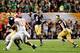MIAMI GARDENS, FL - JANUARY 07: Everett Golson #5 of the Notre Dame Fighting Irish drops back against the Alabama Crimson Tide during the 2013 Discover BCS National Championship game at Sun Life Stadium on January 7, 2013 in Miami Gardens, Florida. (Photo by Kevin C. Cox/Getty Images)