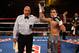LAS VEGAS, NV - JULY 23: Ronny Rios poses with referee Joe Cortez after his first round TKO of Noe Lopez Jr. of Mexico during their junior lightweight bout at Mandalay Bay Events Center on July 23, 2011 in Las Vegas, Nevada. (Photo by Scott Heavey/Getty Images)