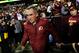 LANDOVER, MD - DECEMBER 30: Head coach Mike Shanahan of the Washington Redskins greets a fan prior to their game against the Dallas Cowboys at FedExField on December 30, 2012 in Landover, Maryland. (Photo by Patrick McDermott/Getty Images)