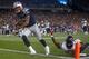 FOXBORO, MA - DECEMBER 10: Aaron Hernandez #81 of the New England Patriots runs in for the touchdown after catching a pass in front of Bradie James #53 of the Houston Texans during the game at Gillette Stadium on December 10, 2012 in Foxboro, Massachusetts. (Photo by Jared Wickerham/Getty Images)