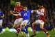 LIVERPOOL, ENGLAND - NOVEMBER 28: Leighton Baines of Everton is challenged by Aaron Ramsey (L) and Mikel Arteta of Arsenal during the Barclays Premier League match between Everton and Arsenal at Goodison Park on November 28, 2012 in Liverpool, England. (Photo by Laurence Griffiths/Getty Images)