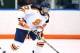 Photo by Michael J. Okoniewski, Image obtained from https://www.suathletics.com/news/2013/1/8/WICE_0108135406.aspx