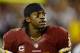 LANDOVER, MD - JANUARY 06: Robert Griffin III #10 of the Washington Redskins walks off of the field injured in the fourth quarter against the Seattle Seahawks during the NFC Wild Card Playoff Game at FedExField on January 6, 2013 in Landover, Maryland. (Photo by Patrick McDermott/Getty Images)