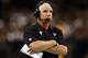 NEW ORLEANS, LA - NOVEMBER 11: Head coach Mike Smith of the Atlanta Falcons watches the game against the New Orleans Saints at The Mercedes-Benz Superdome on November 11, 2012 in New Orleans, Louisiana. The Saints defeated the Falcons 31-27. (Photo by Chris Graythen/Getty Images)