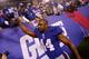 EAST RUTHERFORD, NJ - JANUARY 01: Ahmad Bradshaw #44 of the New York Giants celebrates as he runs off of the field after defeating the Dallas Cowboys at MetLife Stadium on January 1, 2012 in East Rutherford, New Jersey. (Photo by Rich Schultz/Getty Images)