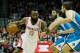 HOUSTON, TX - JANUARY 02: James Harden #13 of the Houston Rockets drives against Greivis Vasquez #21 and Ryan Anderson #33 of the New Orleans Hornets at Toyota Center on January 2, 2013 in Houston, Texas. NOTE TO USER: User expressly acknowledges and agrees that, by downloading and or using this photograph, User is consenting to the terms and conditions of the Getty Images License Agreement. (Photo by Scott Halleran/Getty Images)