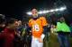 DENVER, CO - DECEMBER 23: Quarterback Peyton Manning #18 of the Denver Broncos walks out to shake hands with members of the Cleveland Browns after a game at Sports Authority Field at Mile High on December 23, 2012 in Denver, Colorado. The Broncos defeated the Browns 34-12. (Photo by Dustin Bradford/Getty Images)