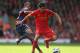 LIVERPOOL, ENGLAND - OCTOBER 07: Steven N' Zonzi of Stoke City challenges Nuri Sahin of Liverpool during the Barclays Premier League match between Liverpool and Stoke City at Anfield on October 7, 2012 in Liverpool, England. (Photo by Clive Brunskill/Getty Images)