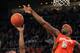 Jan 9, 2013; Providence, RI USA; Syracuse Orange forward C.J. Fair (5) blocks a shot by Providence Friars as Syracuse Orange forward James Southerland (43) helps defend on the play during the second half at the Dunkin' Donuts Center. Syracuse won 72 to 66. Mandatory Credit: Stew Milne-USA TODAY Sports