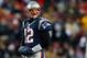 FOXBORO, MA - DECEMBER 30: Tom Brady #12 of the New England Patriots walks to the sideline during a game with the Miami Dolphins at Gillette Stadium in the second quarter on December 30, 2012 in Foxboro, Massachusetts. (Photo by Jim Rogash/Getty Images)