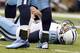 HOUSTON, TX- SEPTEMBER 30: Jake Locker #10 of the Tennessee Titans lies on the field in pain after injuring his left shoulder when Glover Quin #29 of the Houston Texans sacked him on September 30, 2012 at Reliant Stadium in Houston, Texas. (Photo by Thomas B. Shea/Getty Images)