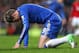 LONDON, ENGLAND - JANUARY 09: Fernando Torres of Chelsea falls to his knees during the Capital One Cup Semi-Final first leg match between Chelsea and Swansea City at Stamford Bridge on January 9, 2013 in London, England. (Photo by Clive Mason/Getty Images)