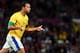 MANCHESTER, ENGLAND - AUGUST 07: Leandro Damiao of Brazil reacts after scoring during the Men's Football Semi Final match between Korea and Brazil, on Day 11 of the London 2012 Olympic Games at Old Trafford on August 7, 2012 in Manchester, England. (Photo by Stanley Chou/Getty Images)