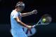 MELBOURNE, AUSTRALIA - JANUARY 08: Roger Federer of Switzerland plays a backhand during practice ahead of the 2013 Australian Open at Melbourne Park on January 8, 2013 in Melbourne, Australia. (Photo by Quinn Rooney/Getty Images)