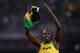 LONDON, ENGLAND - AUGUST 11: Usain Bolt of Jamaica celebrates winning gold and setting a new world record of 36.84 during the Men's 4 x 100m Relay Final on Day 15 of the London 2012 Olympic Games at Olympic Stadium on August 11, 2012 in London, England. (Photo by Clive Brunskill/Getty Images)