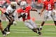 COLUMBUS, OH - OCTOBER 23: Jordan Hall #7 of the Ohio State Buckeyes runs with the ball against the Purdue Boilermakers at Ohio Stadium on October 23, 2010 in Columbus, Ohio. (Photo by Jamie Sabau/Getty Images)