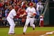 PHILADELPHIA, PA - SEPTEMBER 21: Chase Utley #26 of the Philadelphia Phillies is congratulated by third base coach Juan Samuel #12 after hitting a home run against the Atlanta Braves in the eighth inning during a MLB baseball game on September 21, 2012 at Citizens Bank Park in Philadelphia, Pennsylvania. The Phillies defeated the Braves 6-2. (Photo by Rich Schultz/Getty Images)