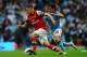 MANCHESTER, ENGLAND - SEPTEMBER 23: Aaron Ramsey of Arsenal is put under pressure by David Silva of Manchester City during the Barclays Premier League match between Manchester City and Arsenal at Etihad Stadium on September 23, 2012 in Manchester, England. (Photo by Laurence Griffiths/Getty Images)