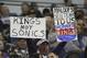 Jan 10, 2013; Sacramento, CA, USA; Sacramento Kings fans hold signs against the Maloof's possible sale of the Kings to a Seattle based group during the third quarter against the Dallas Mavericks at Sleep Train Arena. The Dallas Mavericks defeated the Sacramento Kings 117-112 in overtime. Mandatory Credit: Kelley L Cox-USA TODAY Sports