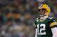 GREEN BAY, WI - JANUARY 05: Quarterback Aaron Rodgers #12 of the Green Bay Packers looks on while taking on the Minnesota Vikings during the NFC Wild Card Playoff game at Lambeau Field on January 5, 2013 in Green Bay, Wisconsin. (Photo by Andy Lyons/Getty Images)