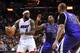 Feb. 21, 2012; Miami, FL, USA; Miami Heat small forward LeBron James (left) is pressured by Sacramento Kings point guard Tyreke Evans (center) and center Chuck Hayes (42) during the second half at American Airlines Arena. Mandatory Credit: Steve Mitchell-USA TODAY Sports