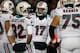 FOXBORO, MA - DECEMBER 30: Ryan Tannehill #17 of the Miami Dolphins stands in a huddle with his teammates against the New England Patriots in the second half at Gillette Stadium on December 30, 2012 in Foxboro, Massachusetts. (Photo by Jim Rogash/Getty Images)