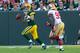 Sep 9, 2012; Green Bay, WI, USA; Green Bay Packers quarterback Aaron Rodgers (12) during the game against the San Francisco 49ers at Lambeau Field. The 49ers defeated the Packers 30-22. Mandatory Credit: Jeff Hanisch-USA TODAY Sports