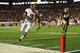 MIAMI GARDENS, FL - JANUARY 07: Amari Cooper #9 of the Alabama Crimson Tide scores a touchdown in the third quarter against the Notre Dame Fighting Irish during the 2013 Discover BCS National Championship game at Sun Life Stadium on January 7, 2013 in Miami Gardens, Florida. (Photo by Streeter Lecka/Getty Images)