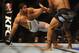 GOLD COAST, AUSTRALIA - DECEMBER 15: Hector Lombard (R) lifts Rousimar Palhares during the Middleweight bout between Hector Lombard and Rousimar Palhares at Gold Coast Convention and Exhibition Centre on December 15, 2012 on the Gold Coast, Australia. (Photo by Matt Roberts/Getty Images)