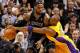 MIAMI, FL - JANUARY 19: LeBron James #6 of the Miami Heat is guarded by Kobe Bryant #24 of the Los Angeles Lakers during a game at American Airlines Arena on January 19, 2012 in Miami, Florida. NOTE TO USER: User expressly acknowledges and agrees that, by downloading and/or using this Photograph, User is consenting to the terms and conditions of the Getty Images License Agreement. (Photo by Mike Ehrmann/Getty Images)