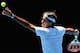 MELBOURNE, AUSTRALIA - JANUARY 08: Roger Federer of Switzerland serves during practice ahead of the 2013 Australian Open at Melbourne Park on January 8, 2013 in Melbourne, Australia. (Photo by Quinn Rooney/Getty Images)