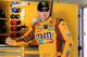 DAYTONA BEACH, FL - JANUARY 11: Kyle Busch, driver of the #18 Toyota, stands in the garage area during NASCAR Sprint Cup Series Preseason Thunder testing at Daytona International Speedway on January 11, 2013 in Daytona Beach, Florida. (Photo by Chris Trotman/Getty Images for NASCAR)