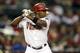 PHOENIX, AZ - OCTOBER 02: Justin Upton #10 of the Arizona Diamondbacks bats against the Colorado Rockies during the MLB game at Chase Field on October 2, 2012 in Phoenix, Arizona. The Diamondbacks defeated the Rockies 5-3. (Photo by Christian Petersen/Getty Images)