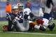 FOXBORO, MA - DECEMBER 16: Quarterback Tom Brady #12 of the New England Patriots gets tackled just shy of the end zone against the San Francisco 49ers at Gillette Stadium on December 16, 2012 in Foxboro, Massachusetts. (Photo by Jared Wickerham/Getty Images)
