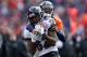 DENVER, CO - JANUARY 12: Torrey Smith #82 of the Baltimore Ravens can't make the catch on a pass as he is defended by Champ Bailey #24 of the Denver Broncos in the second quarter during the AFC Divisional Playoff Game at Sports Authority Field at Mile High on January 12, 2013 in Denver, Colorado. (Photo by Jeff Gross/Getty Images)