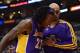 LOS ANGELES, CA - JANUARY 04: Jordan Hill #27 of the Los Angeles Lakers gets helped off the court by Robert Sacre #50 during a 107-102 Los Angeles Clipper win at Staples Center on January 4, 2013 in Los Angeles, California. NOTE TO USER: User expressly acknowledges and agrees that, by downloading and or using this photograph, User is consenting to the terms and conditions of the Getty Images License Agreement. (Photo by Harry How/Getty Images)