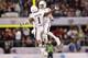 ARLINGTON, TX - JANUARY 04: Johnny Manziel #2 of the Texas A&M Aggies celebrates a touchdown with Ben Malena #1 against the Oklahoma Sooners during the Cotton Bowl at Cowboys Stadium on January 4, 2013 in Arlington, Texas. (Photo by Ronald Martinez/Getty Images)