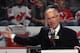 NEWARK, NJ - DECEMBER 16: Mike 'Doc' Emrick takes part in the Scott Niedermayer jersey retirement ceremony by the New Jersey Devils prior to the game against the Dallas Stars at the Prudential Center on December 16, 2011 in Newark, New Jersey. (Photo by Bruce Bennett/Getty Images)