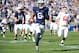 Nov 17, 2012; University Park, PA, USA; Penn State Nittany Lions wide receiver Allen Robinson (8) runs with the ball on his way to the end zone for a touchdown during the second quarter against the Indiana Hoosiers at Beaver Stadium. Mandatory Credit: Rich Barnes-USA TODAY Sports