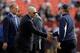 LANDOVER, MD - NOVEMBER 20: Dallas Cowboys owner Jerry Jones (L) shakes hands with head coach Jason Garrett (R) before the start of the Cowboys game against the Washington Redskins at FedExField on November 20, 2011 in Landover, Maryland. (Photo by Rob Carr/Getty Images)